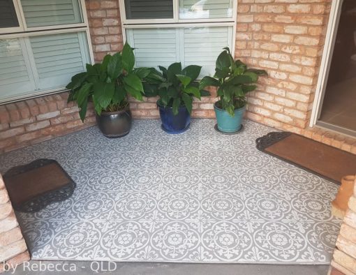 Painted patio floor using a tile stencil.